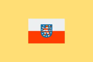 Hier ist die Flagge Thüringens zu sehen. Erfahre alles zum Thema Förderung Photovoltaik Thüringen 2024