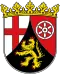Leider kann ich nicht genau sagen, um welches Wappen es sich handelt. Ein treffender Alt-Text könnte so lauten:Farbiges Wappen mit Löwe, Kreuz und Rad, gekrönt, aufgeteilt in drei Felder.