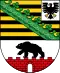 Wappen von Sachsen-Anhalt: Schwarz-gelbe Streifen, Bär auf Ziegelmauer, grüner Rankenbalken, Adler im oberen Eck.